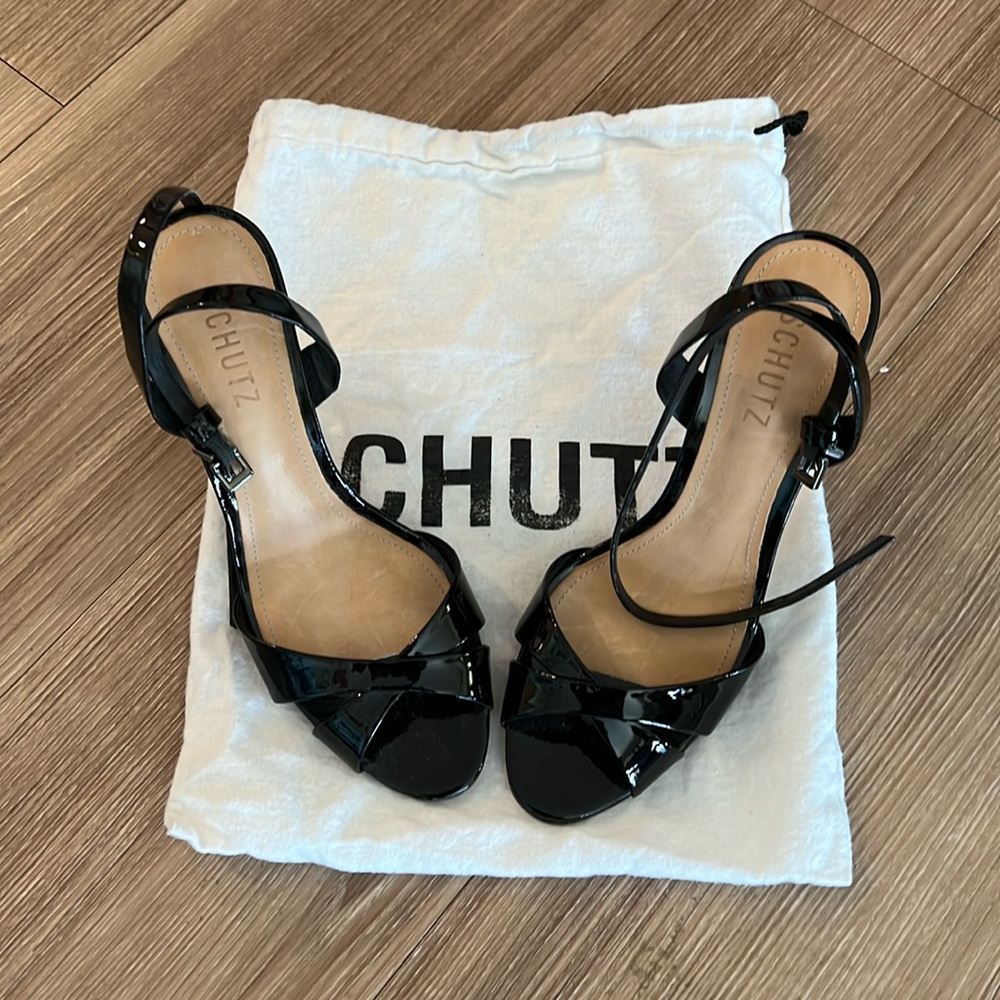 Black Patent Schutz strap heels